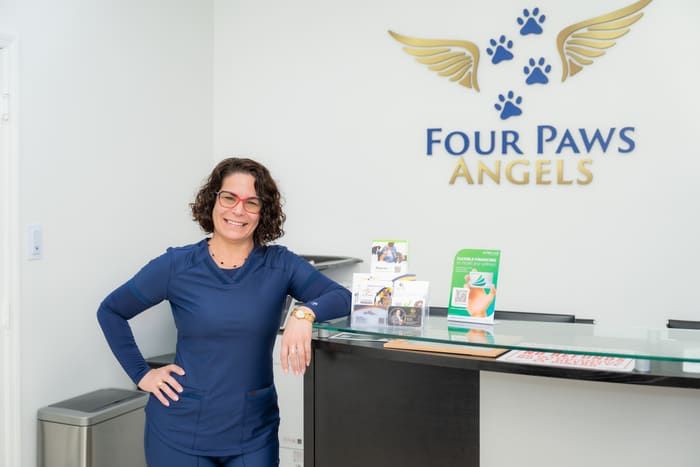 Four Paws Angels team member at the front desk